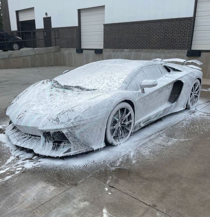 Lamborghini Aventador covered in foam during a premium hand wash